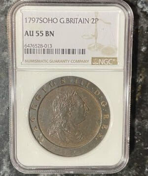 1797 British two pence coin graded AU55 BN in a protective case.