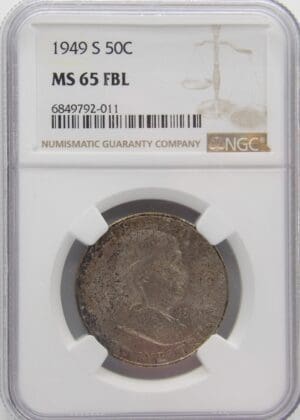 Close-up of a graded MS 65 FBL coin in a protective case.